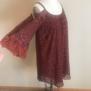 Burnt orange boho style dress.